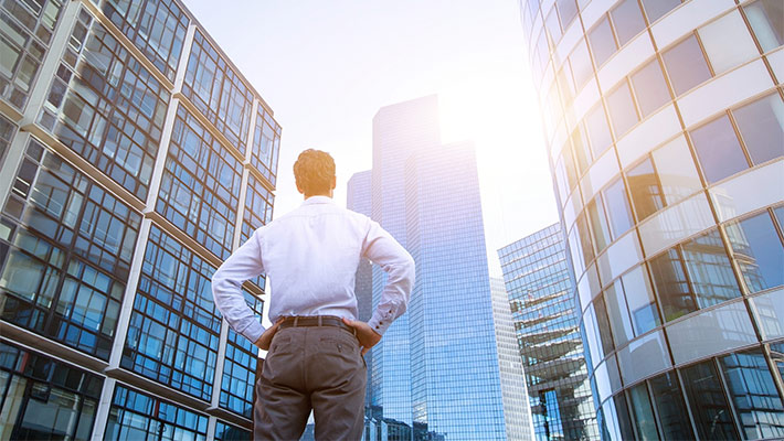 Man looking at the buildings