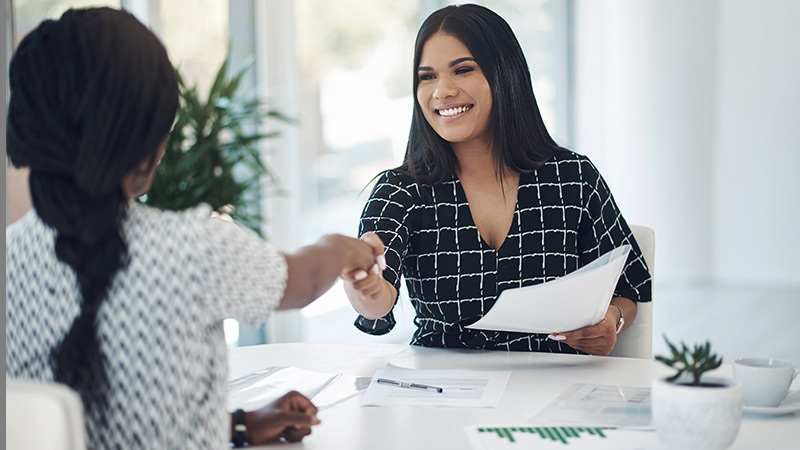 Employees are talking and smiling