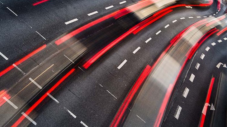 fast paced traffic on highway road