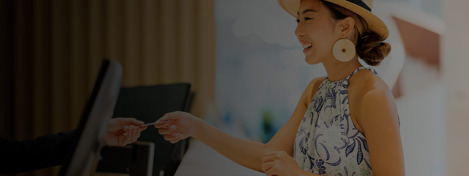 Woman at the front desk of a hotel