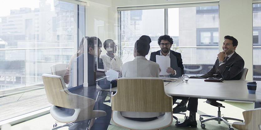 A small team discussing in office