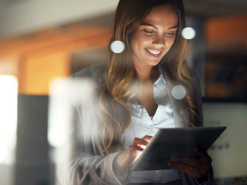 IT employee working on tablet