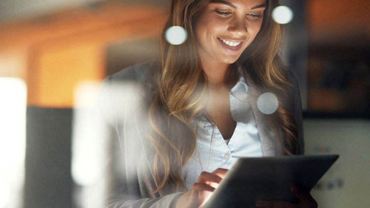 IT employee working on tablet