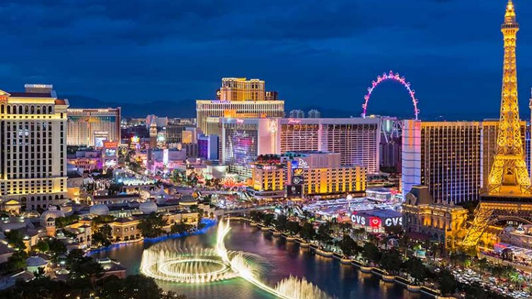 USA, Nevada, Las Vegas, Strip, fountain, hotels and Eiffel Tower at blue hour