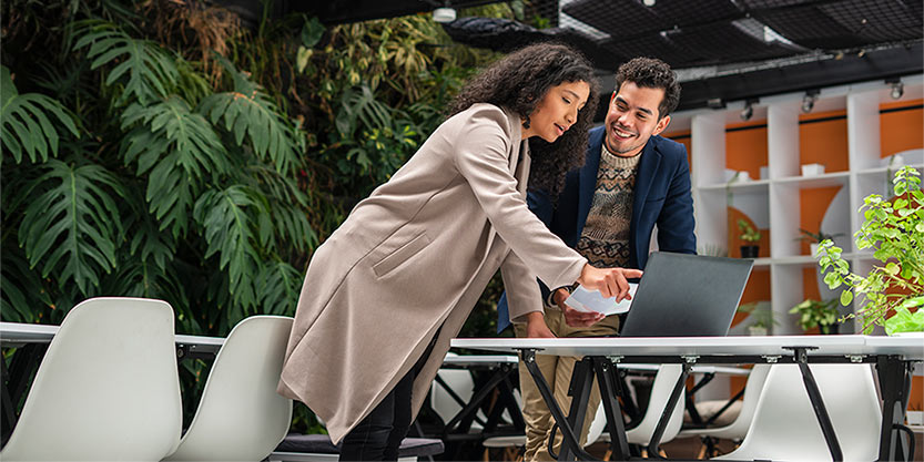 Coworkers are working as a team to solve a company activity