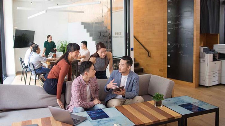 people discussing at office