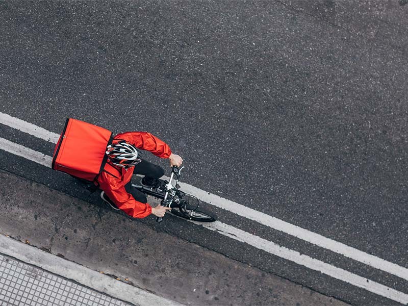 logistics sector delivery person going to deliver the package