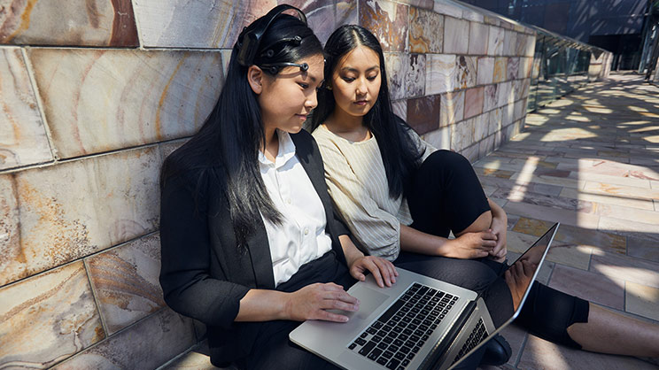 Two girls working in Laptop