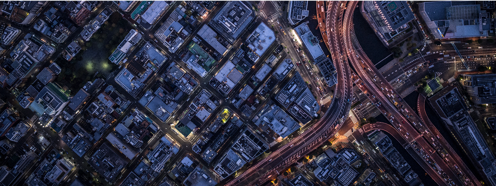 Aerial view of developed city at night time