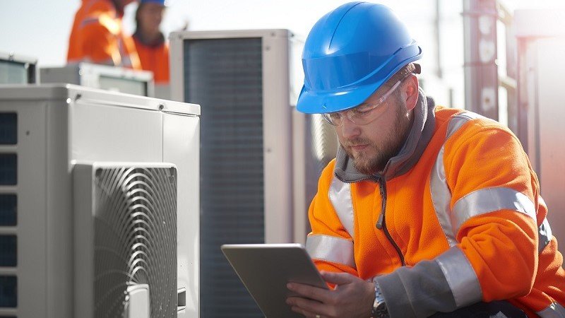 An architect working on his tablet