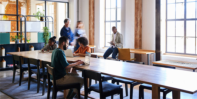Group of people working in a coworking space