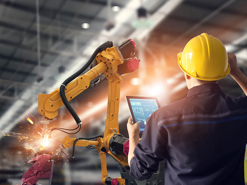 A man with tablet in construction site