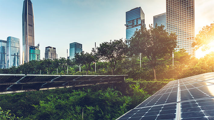 Solar panels and green space in city