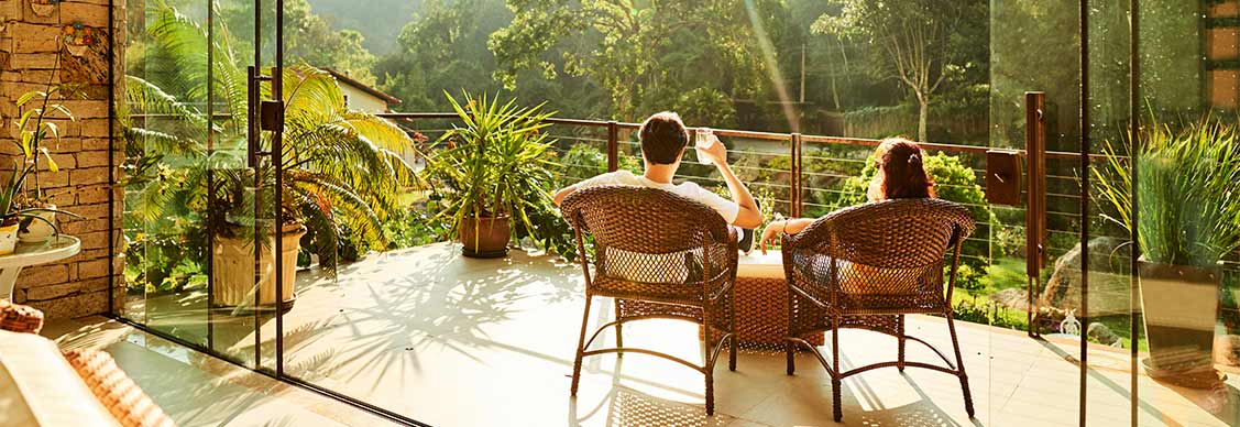 A couple having coffee while sitting