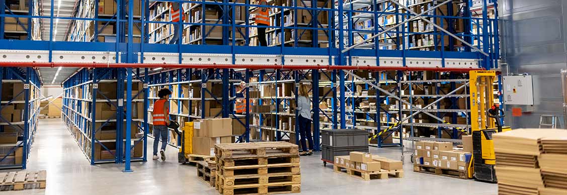 Large distribution warehouse with people working
