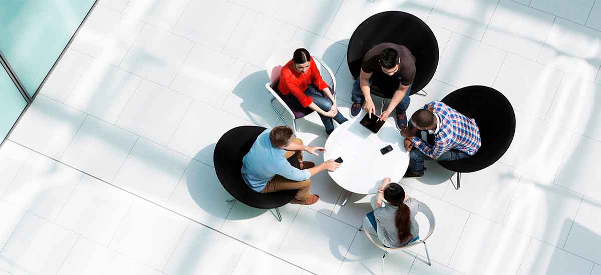 Group of professionals together and discussing